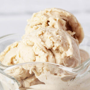 close of view of scoops of cinnamon protein frozen yogurt in a glass ice cream dish