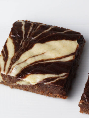 top view of one peppermint swirl brownie on a white plate