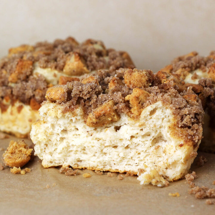 individual coffee cakes with the one in front sliced open