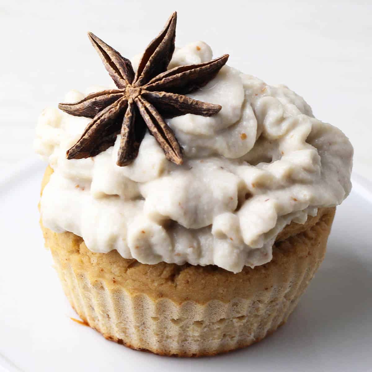 frosted cupcake with a whole star anise on top