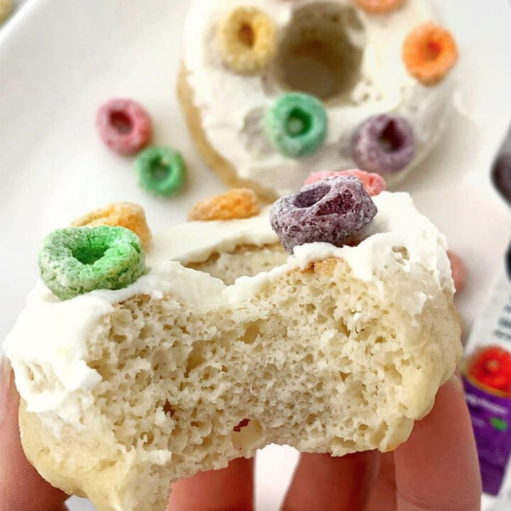 cake donut topped with icing and froot loops