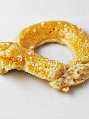 part of a soft pretzel on a white background