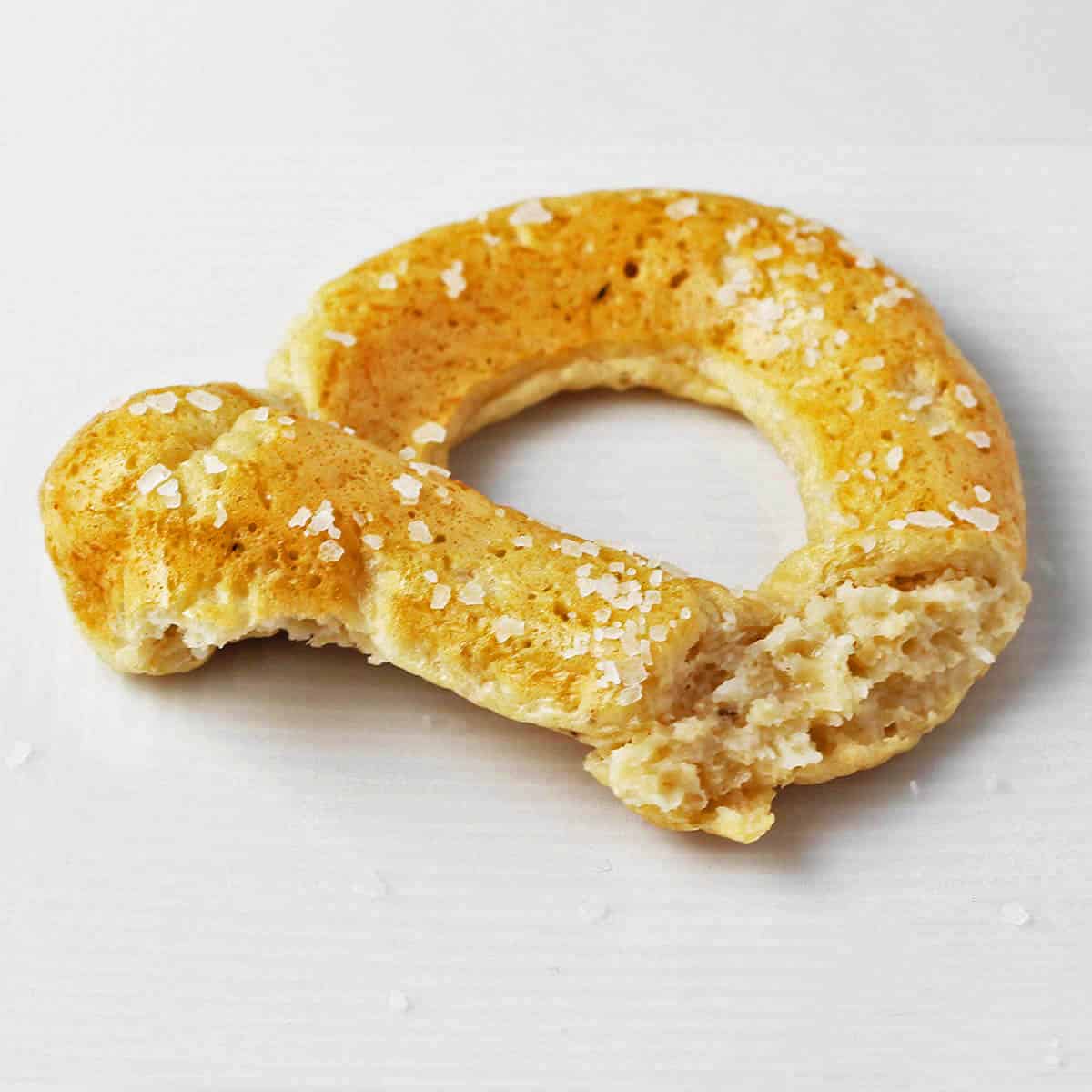 part of a soft pretzel on a white background