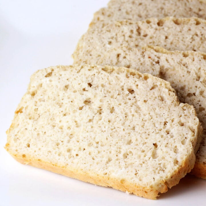 slices of protein bread on a white plate.