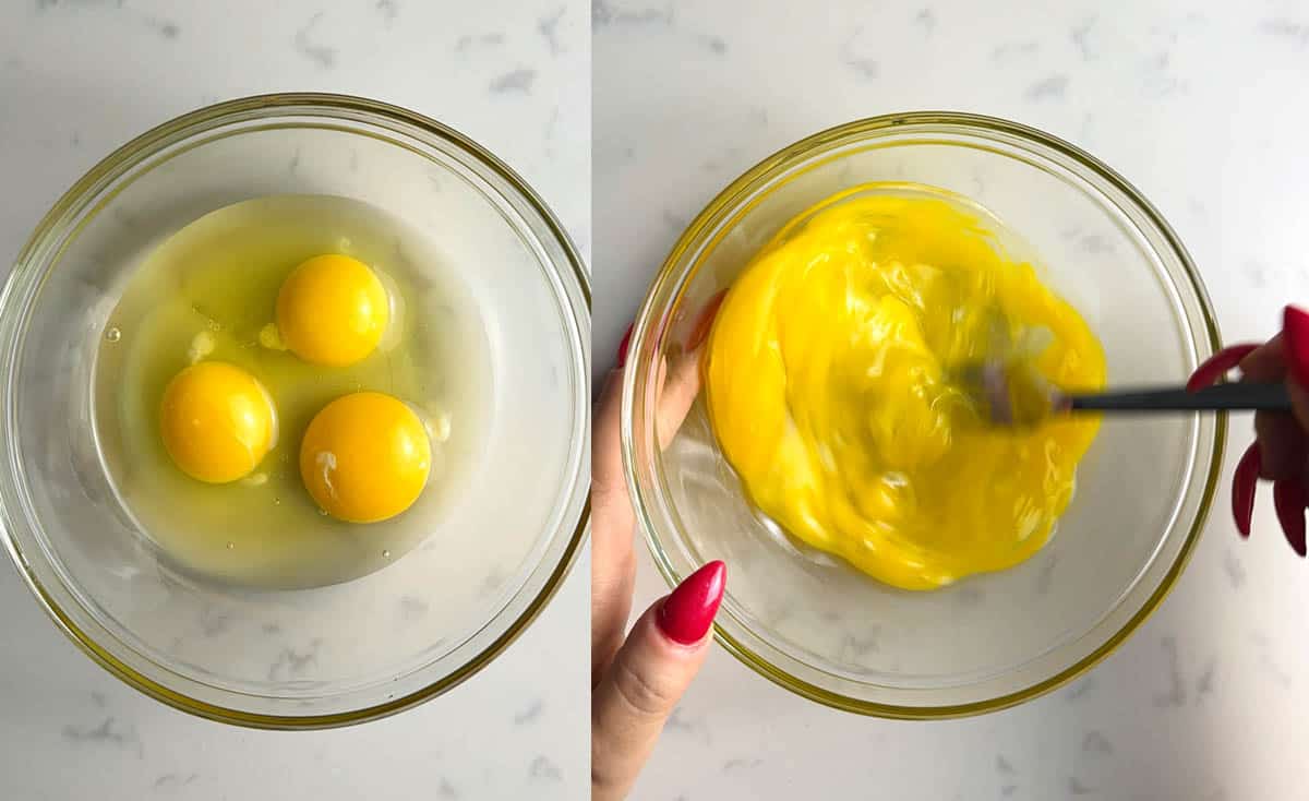 three eggs being beaten with a fork