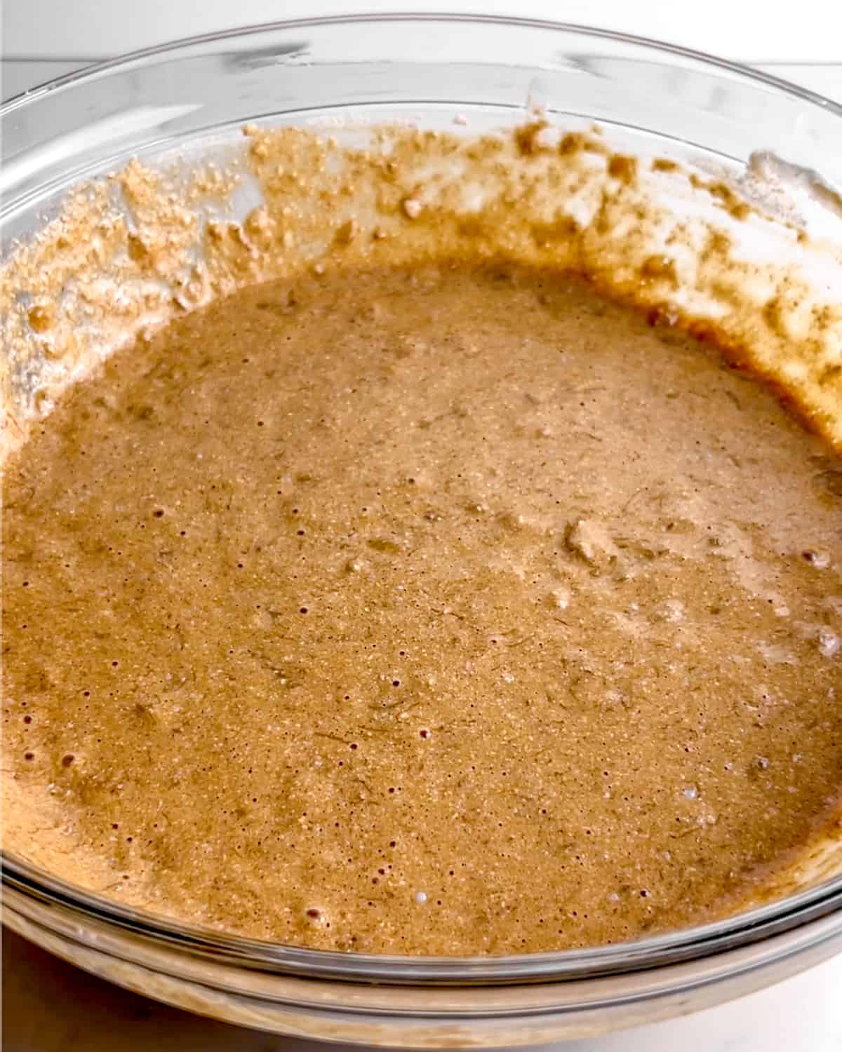 bowl of protein banana bread batter before adding nuts