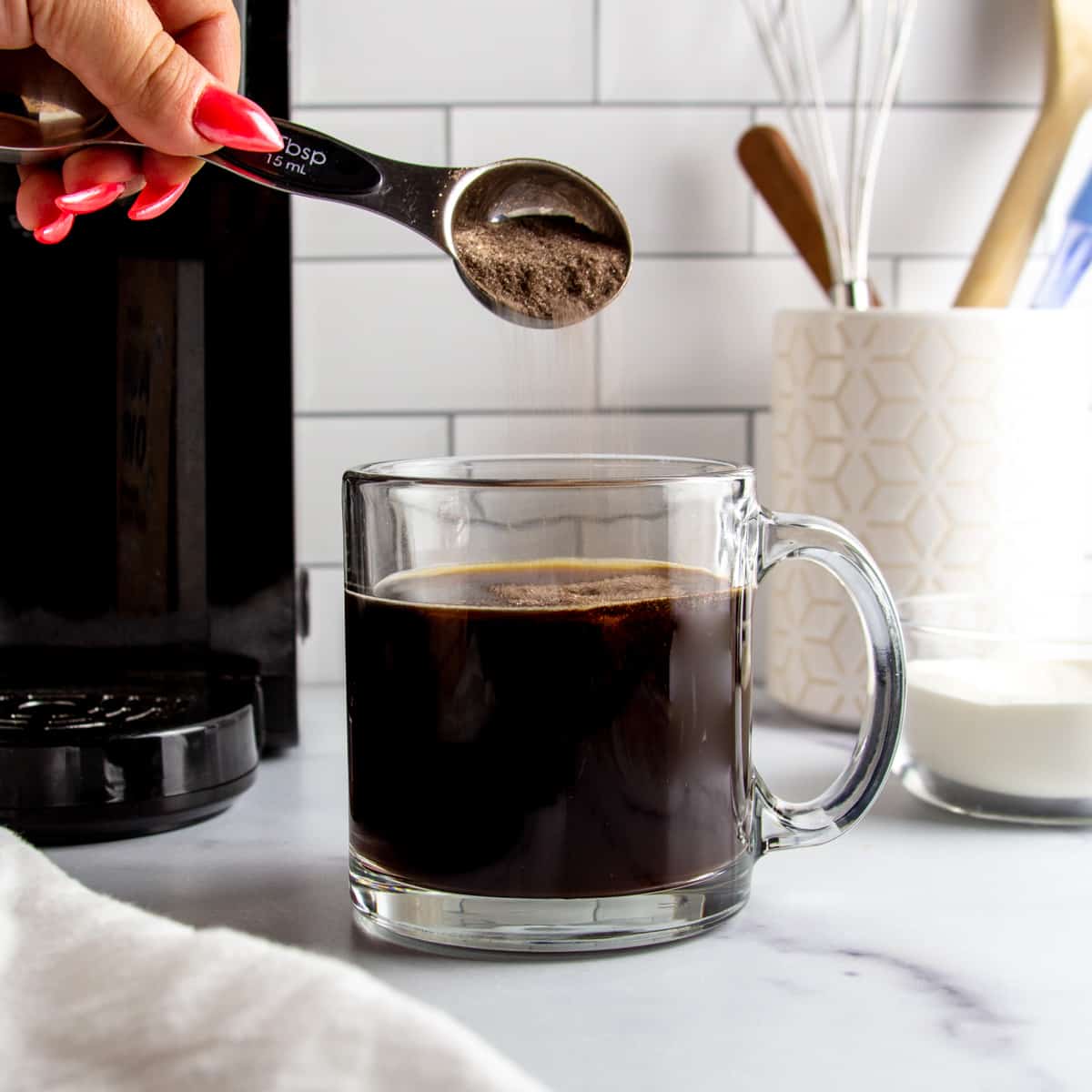 mushroom mix being added to hot coffee