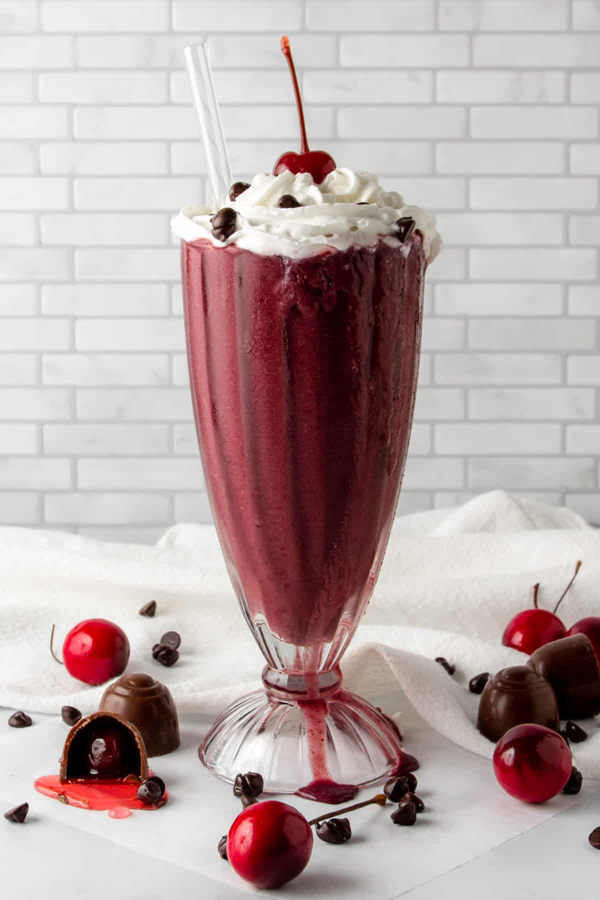 chocolate cherry protein shake with whipped cream.
