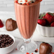 chocolate strawberry protein shake with whipped cream.