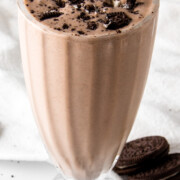 oreo protein shake topped with oreos.