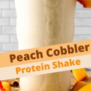 peach cobbler protein shake with text overlay.