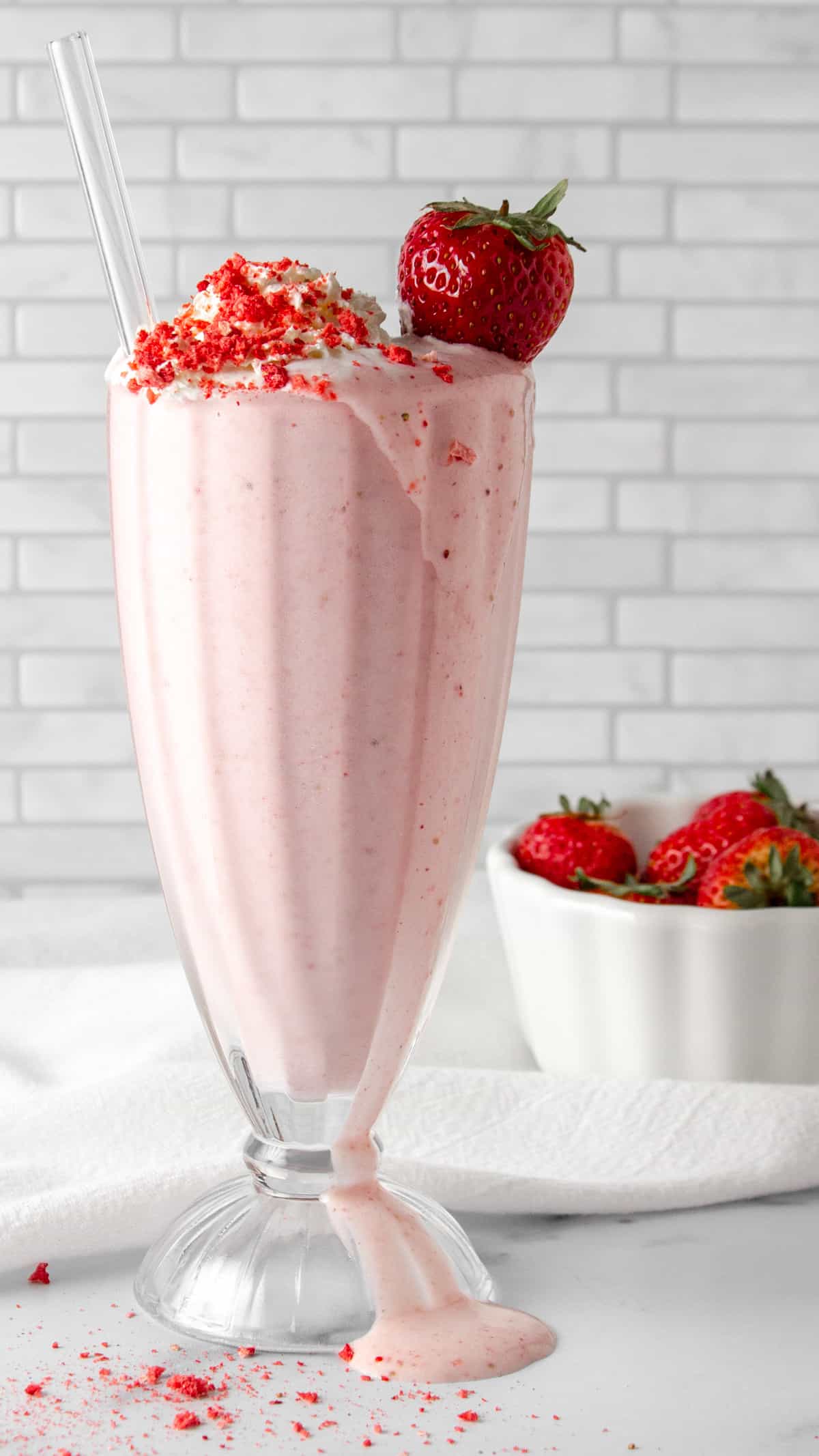 strawberry protein shake with toppings.