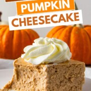 piece of pumpkin protein cheesecake topped with sugar free whipped cream, with a forkful of cheesecake, with text overlay.