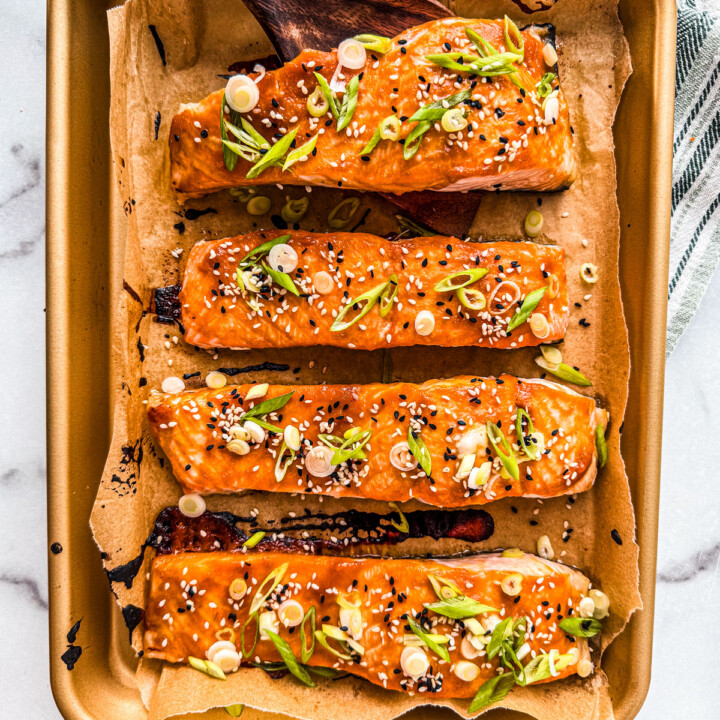4 pieces of salmon in a baking dish.