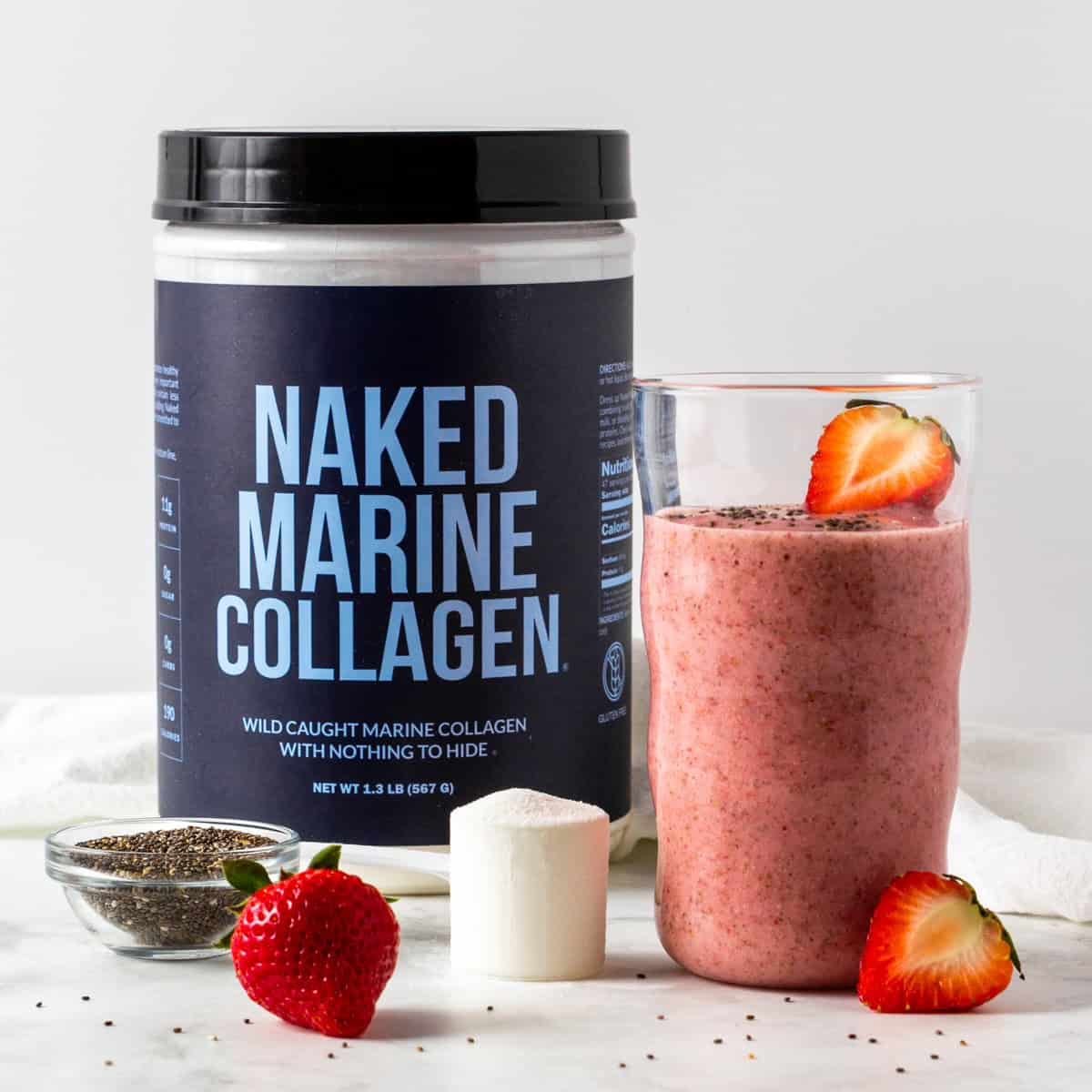 strawberry chia collagen smoothie next to a container of Naked marine Collagen.