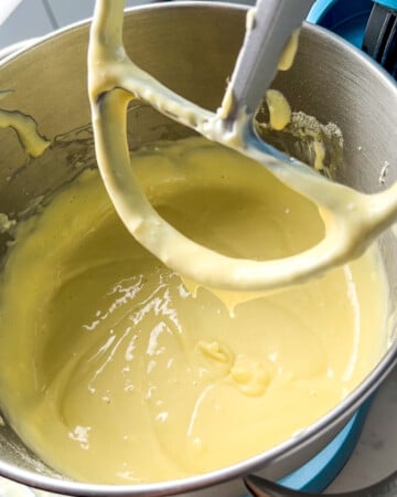 protein cheesecake batter in mixer, after adding the whey and stevia.