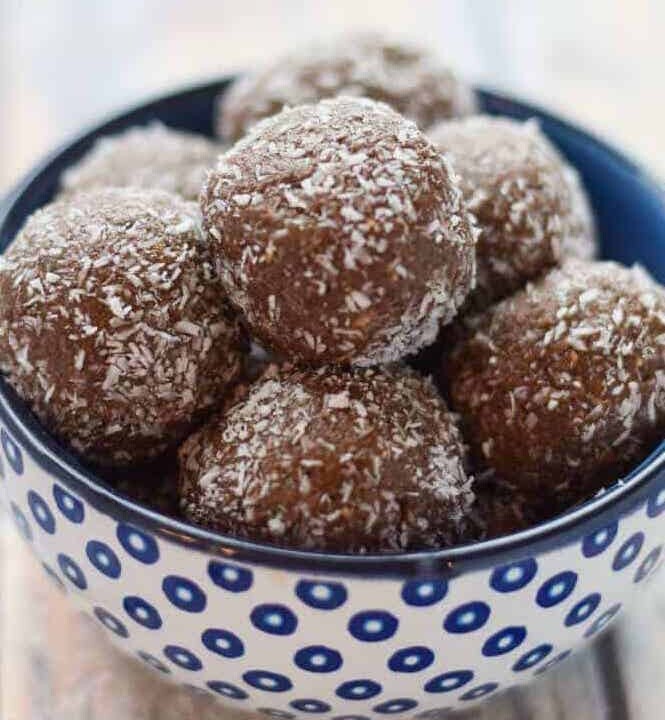 chocolate almond protein balls in a bowl.