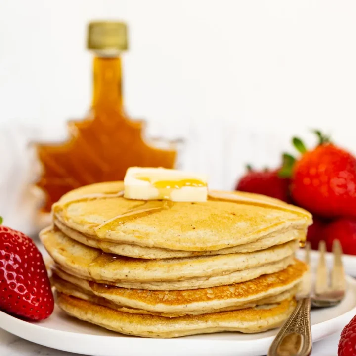 stack of protein pancakes with butter and syrup.