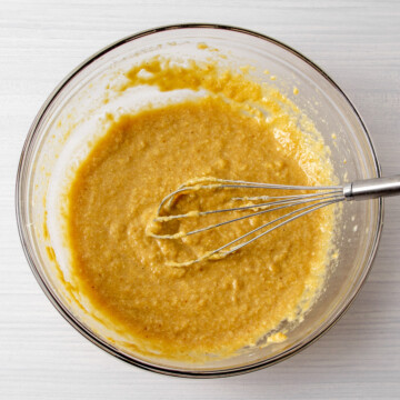 protein blondie batter in a bowl before adding chocolate chips.