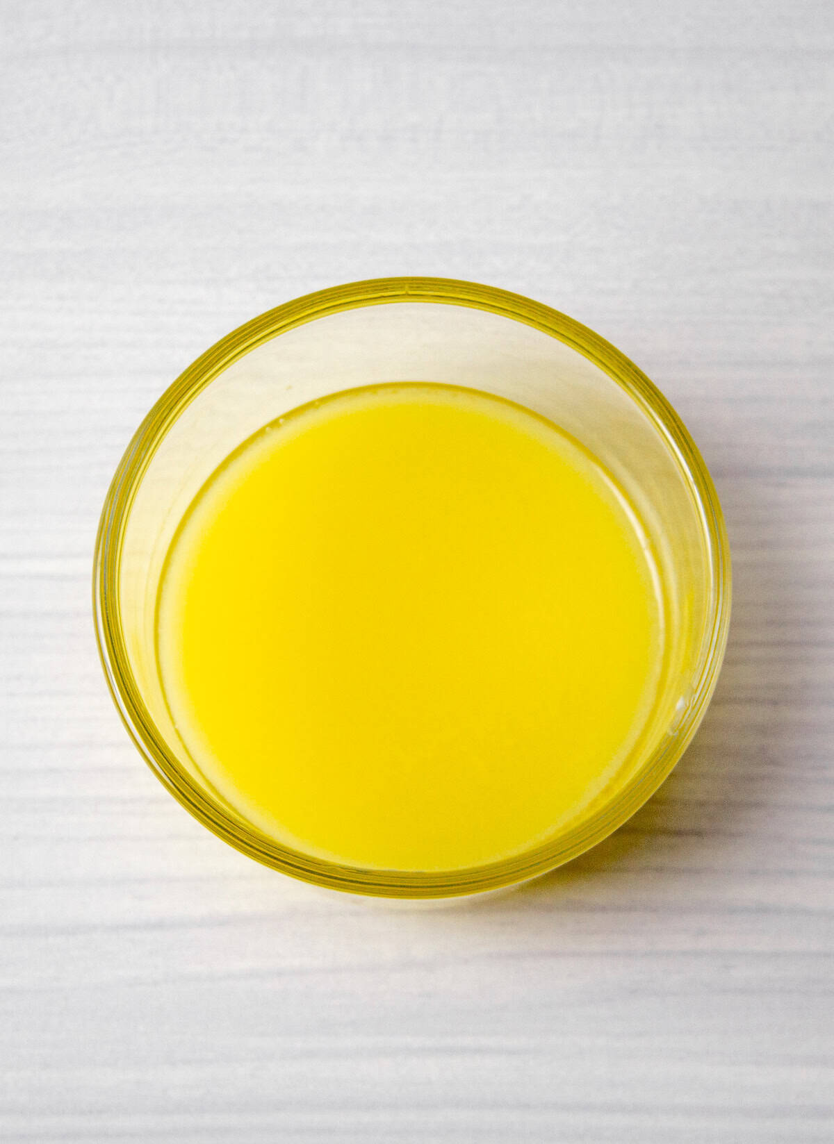 melted butter in a small glass bowl.