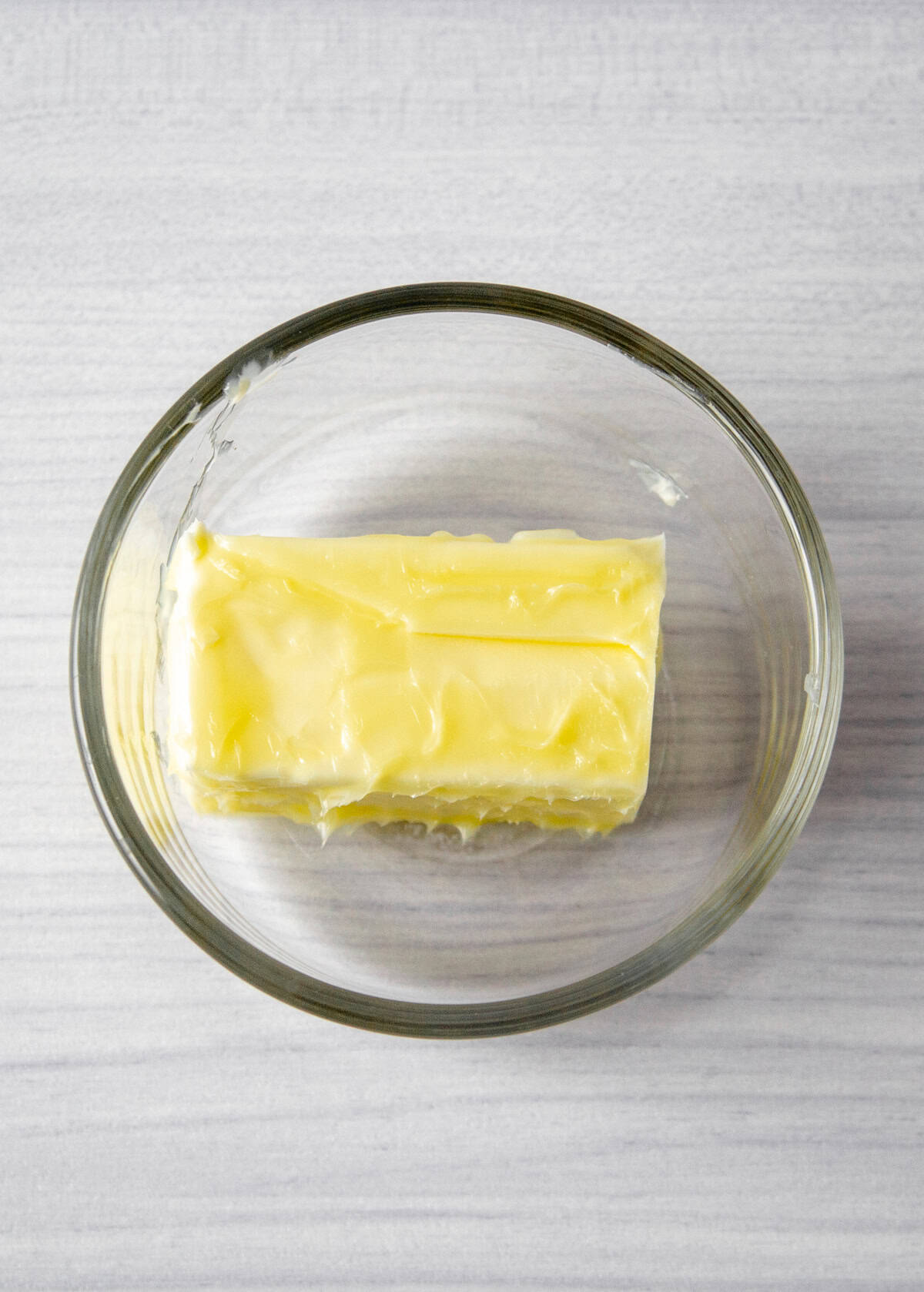 half a stick of butter in a small glass bowl.