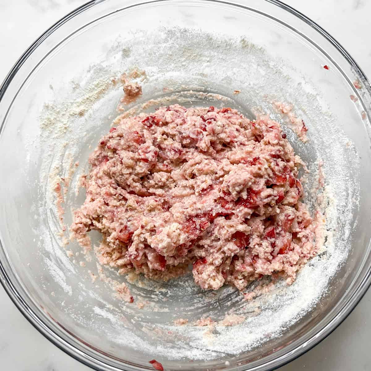 strawberry protein cookie batter in a glass bowl.