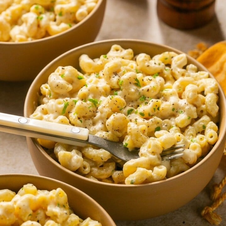 bowls of high protein macaroni and cheese made with cottage cheese.