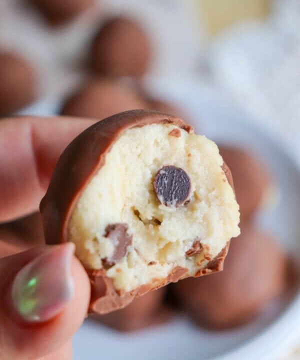 chocolate covered cottage cheese protein balls with chocolate chips.