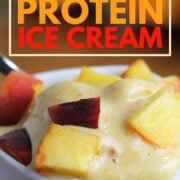 melting peach protein ice cream with chopped peaches on top, with text overlay.
