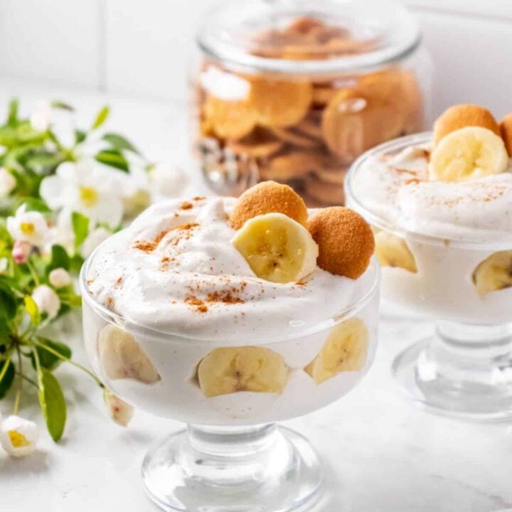 Delicious protein banana dessert with whipped cream and cookies.