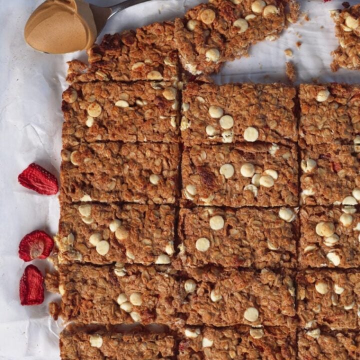 High-protein, gluten-free granola bars with oats and white chocolate chips. Perfect for a healthy snack or post-workout treat.
