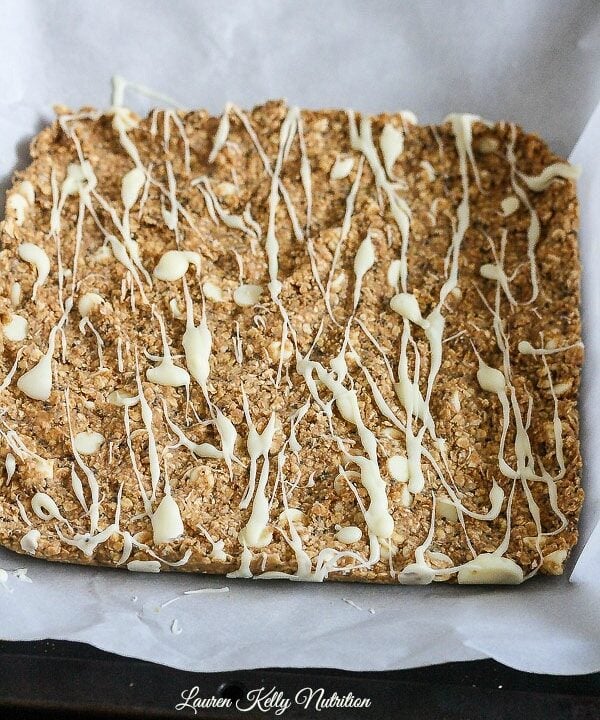 Protein-packed crunchy protein bar with white chocolate drizzle. Perfect healthy snack.